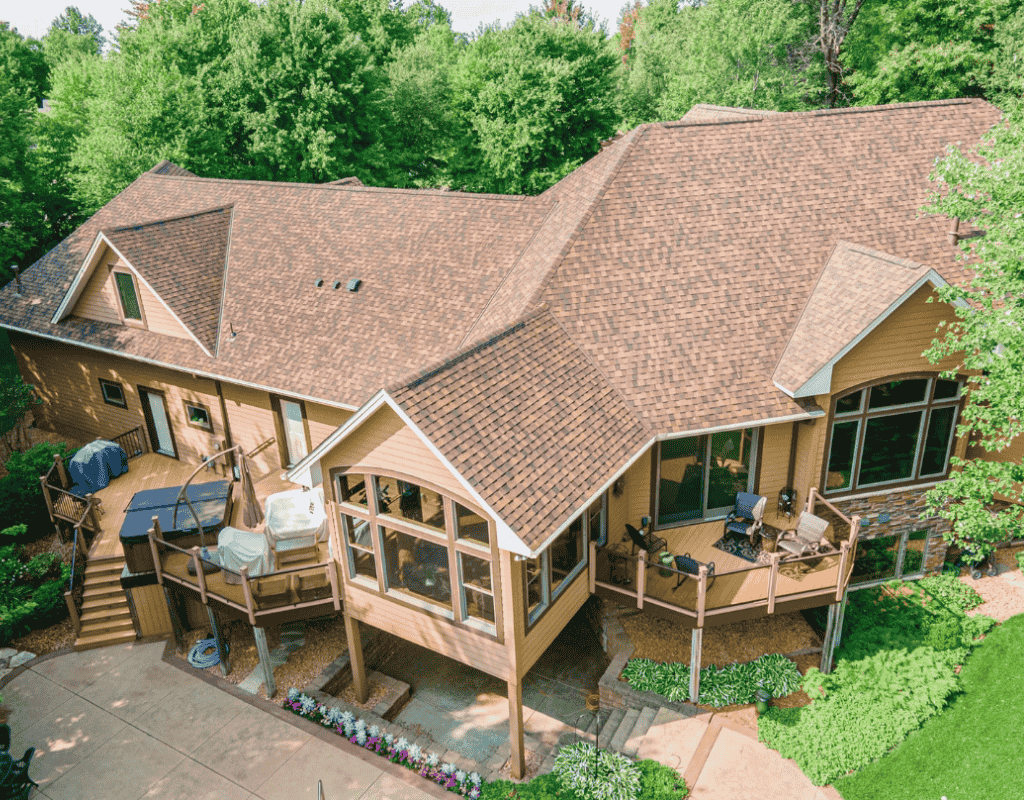 Professional roofing contractors from Third Coast Roofing Co inspecting residential roof in Chicagoland Illinois